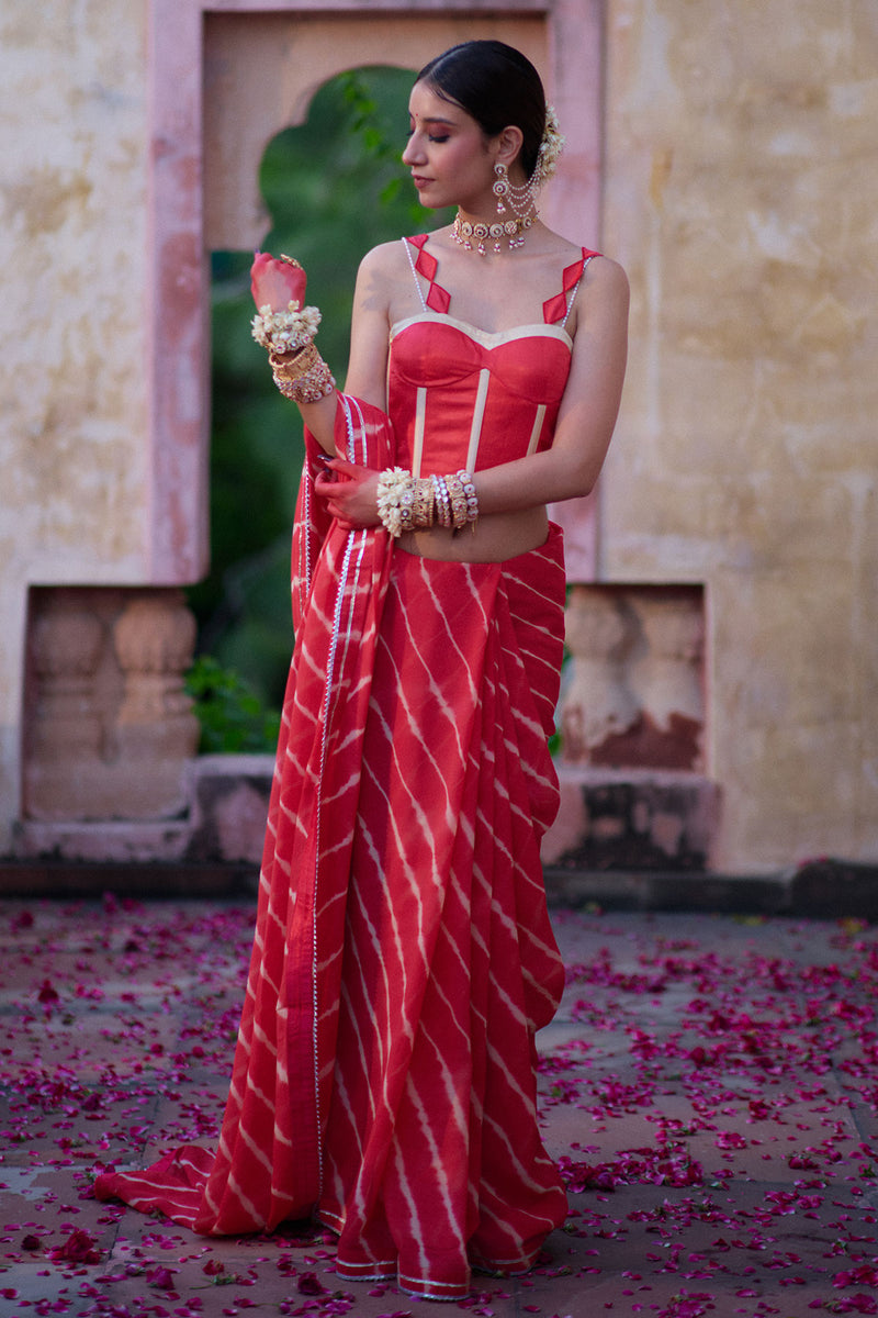 Tarangini – Watermelon Leheriya Saree and Corset Blouse with Pearl Strings