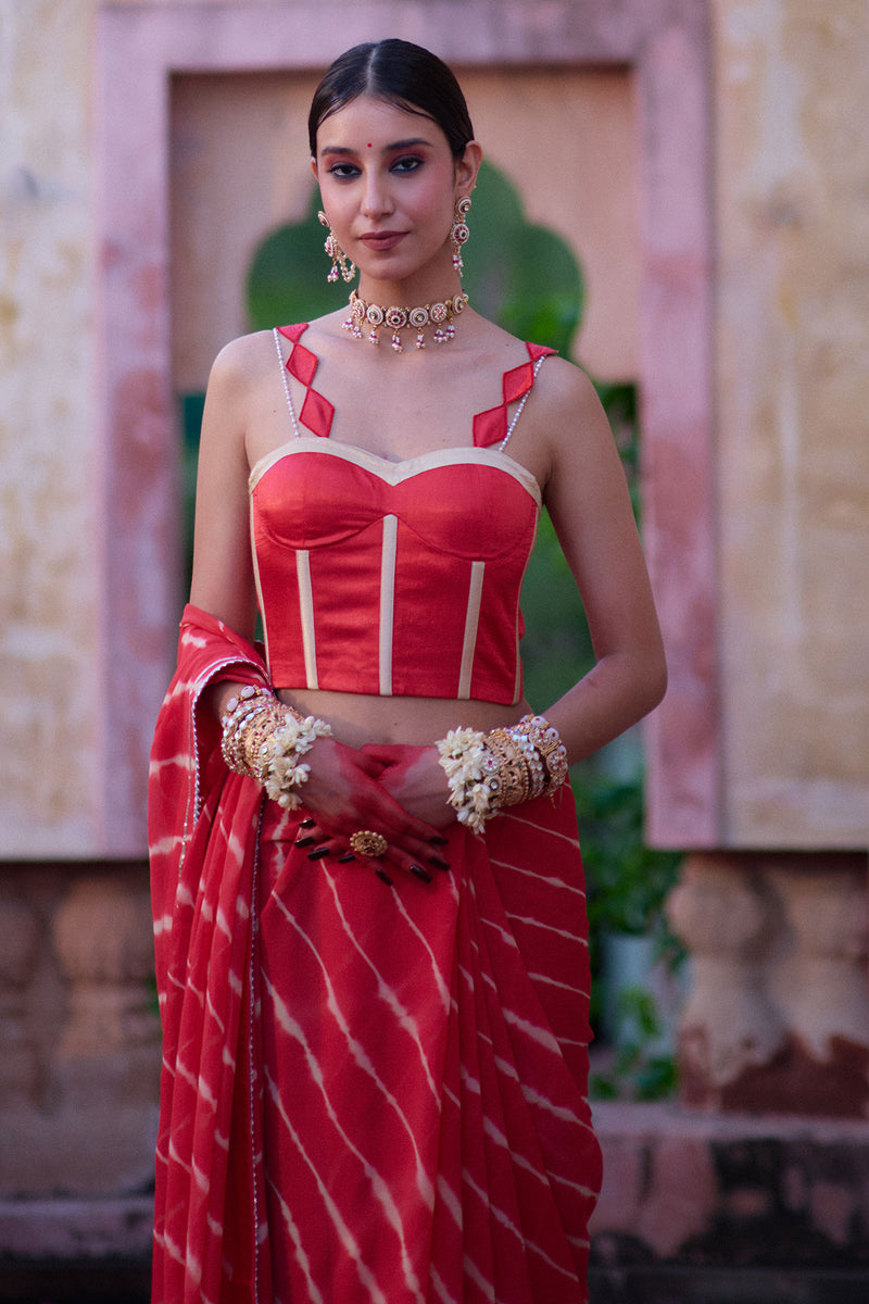 Tarangini – Watermelon Leheriya Saree and Corset Blouse with Pearl Strings