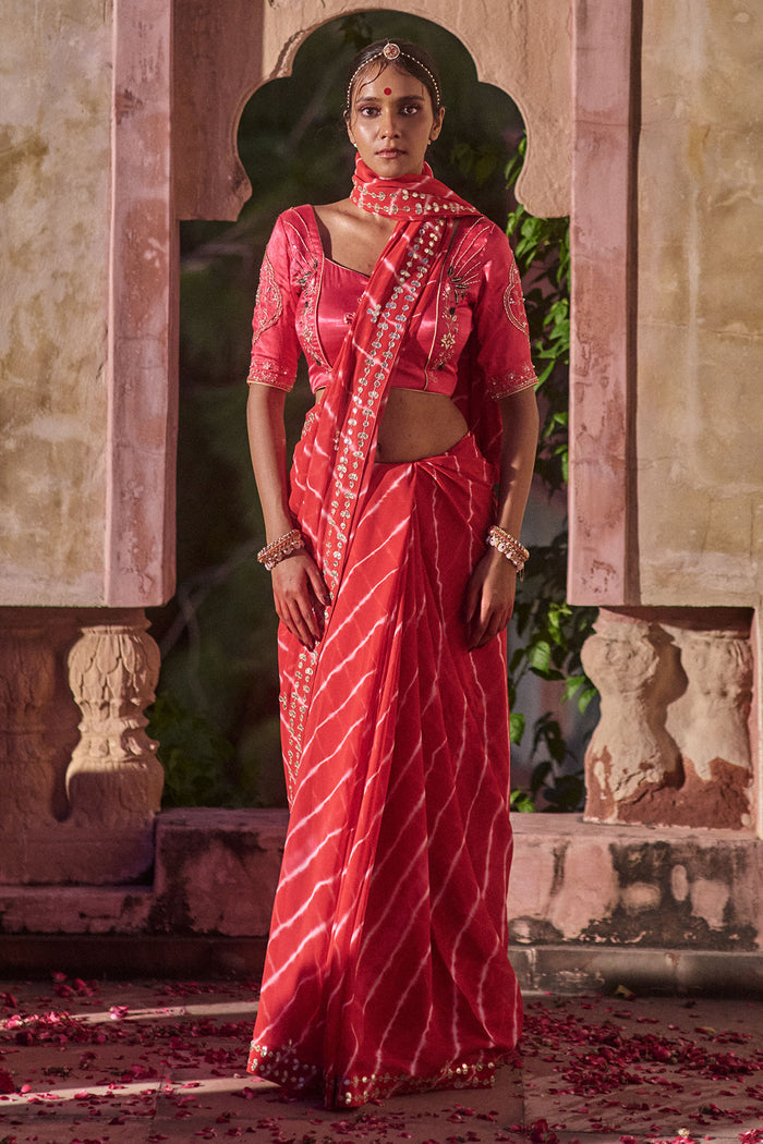 Rajlakshmi  – Red Leheriya Saree with Rani Pink  Blouse