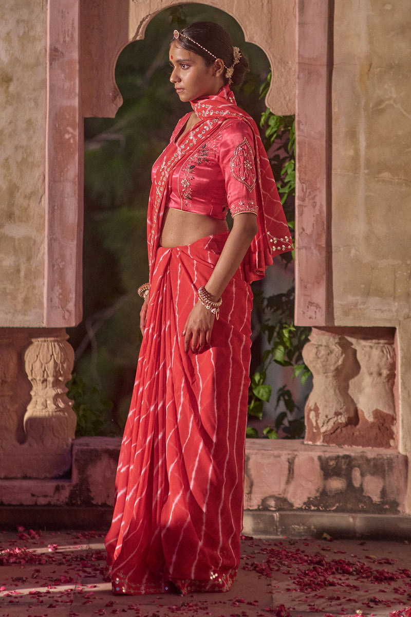 Rajlakshmi  – Red Leheriya Saree with Rani Pink  Blouse