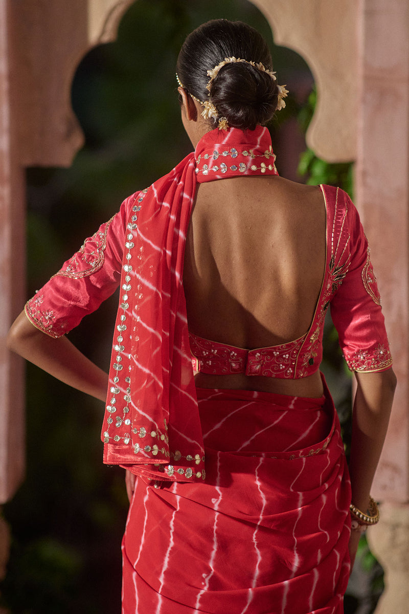 Rajlakshmi  – Red Leheriya Saree with Rani Pink  Blouse