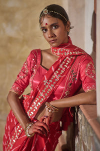 Rajlakshmi  – Red Leheriya Saree with Rani Pink  Blouse