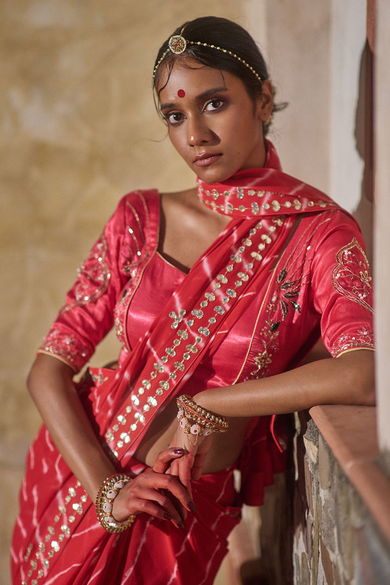 Rajlakshmi  – Red Leheriya Saree with Rani Pink  Blouse