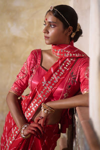 Rajlakshmi  – Red Leheriya Saree with Rani Pink  Blouse