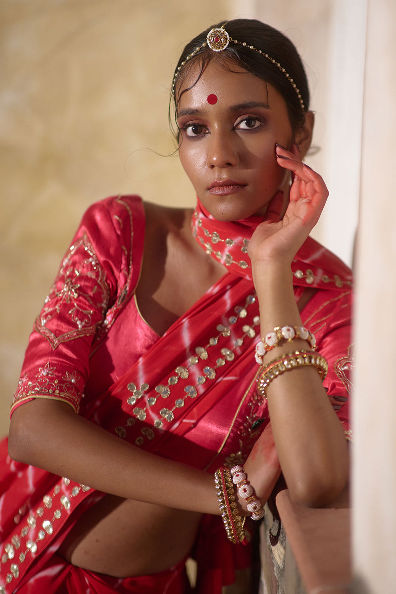Rajlakshmi  – Red Leheriya Saree with Rani Pink  Blouse