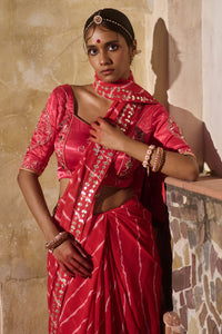 Rajlakshmi  – Red Leheriya Saree with Rani Pink  Blouse