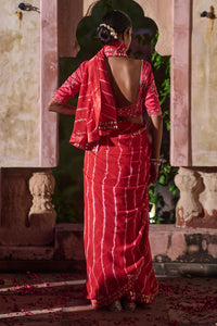 Rajlakshmi  – Red Leheriya Saree with Rani Pink  Blouse